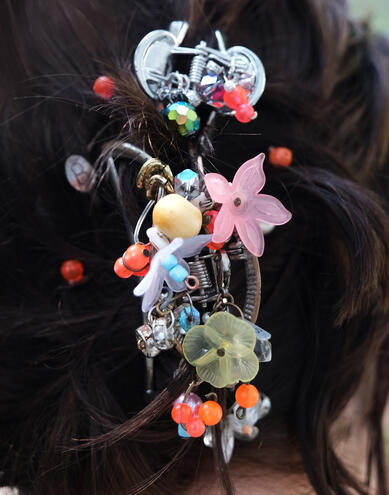 burst hairclip - 2023 - found objects, discarded beads, metal hairclip, marine plastic debris