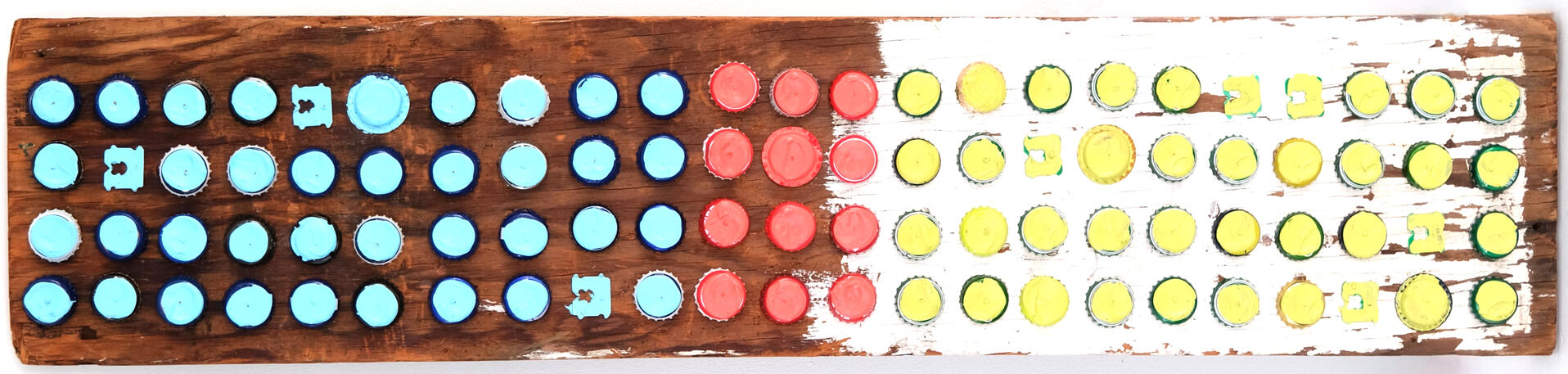 found pattern - 2023 - bottlecaps, bread tags, discarded paint, reclaimed wood.
