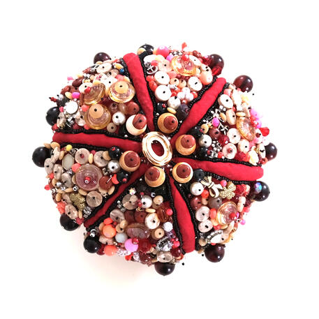 mama urchin, back - 2024 - marine plastics, fishing gear, broken jewelry, discarded beads.